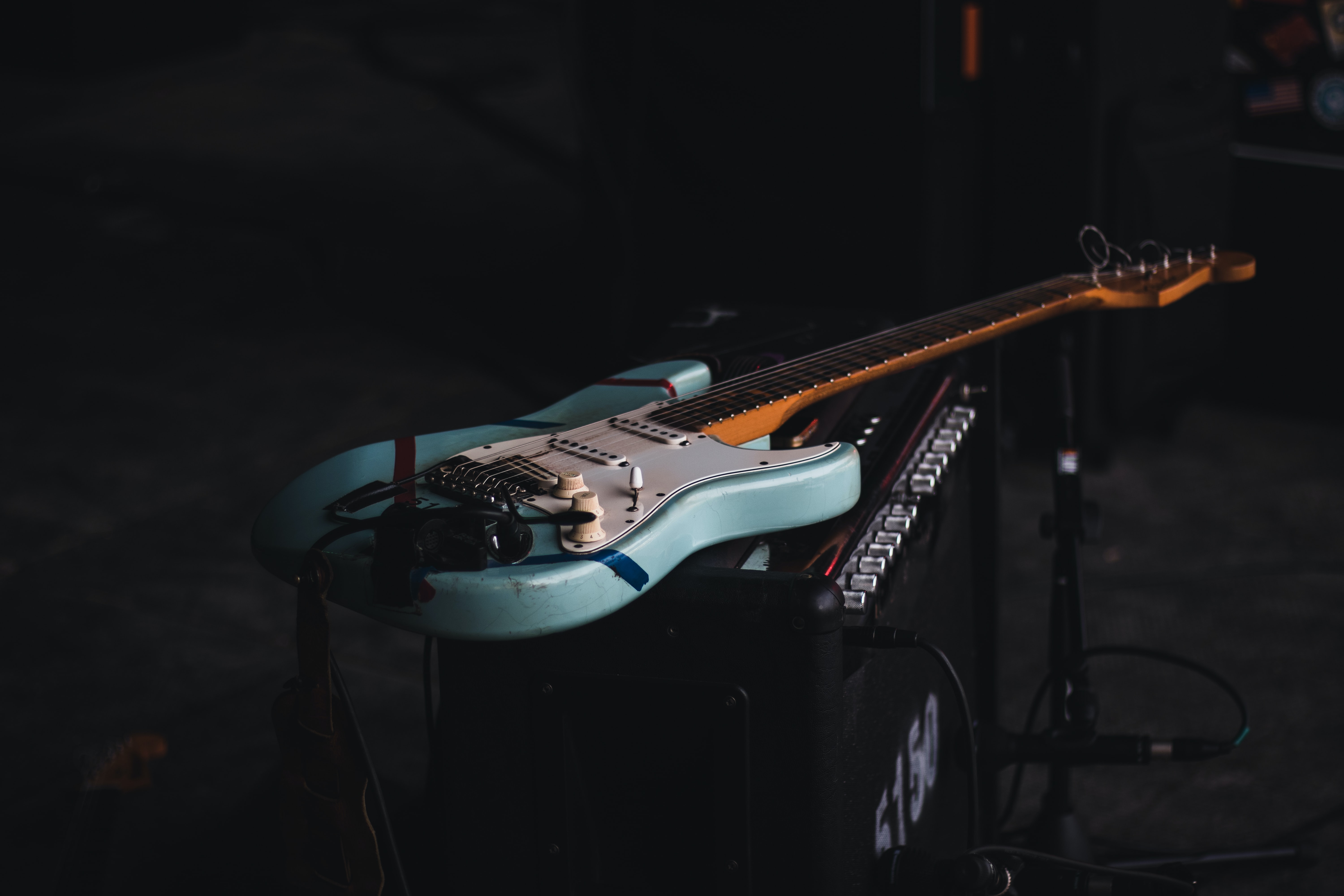 guitar lying on amplifier